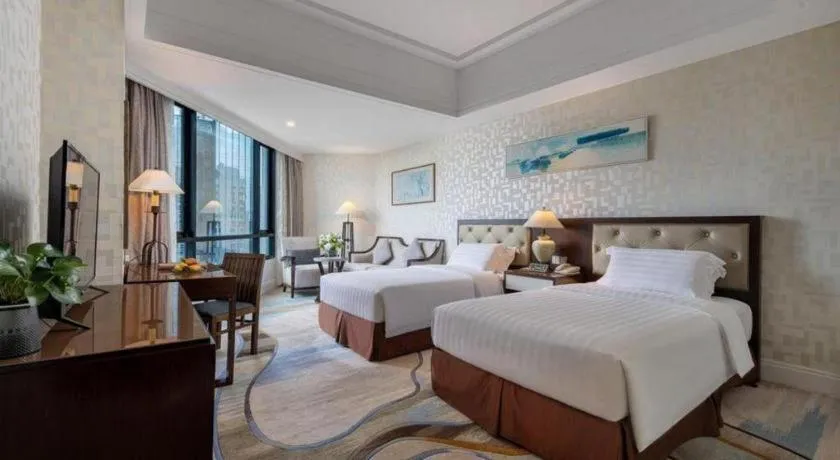 Bed in Hainan Junhua Haiyi Hotel