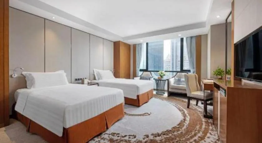 Bed in Hainan Junhua Haiyi Hotel