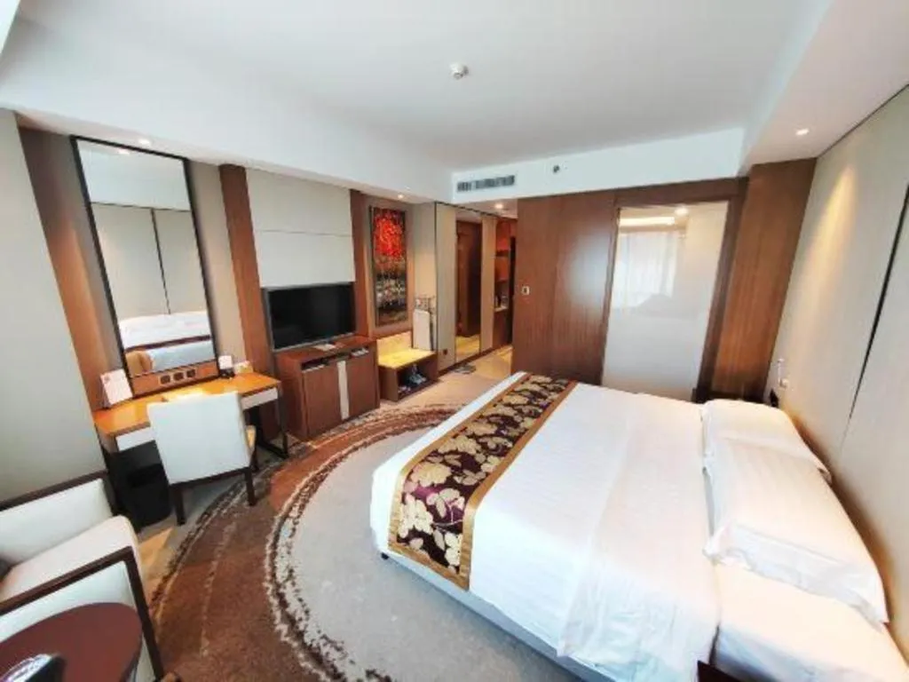 Bed in Hainan Junhua Haiyi Hotel