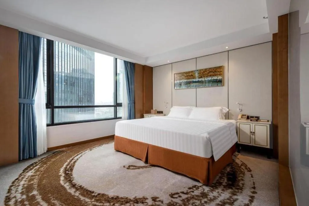 Bed in Hainan Junhua Haiyi Hotel