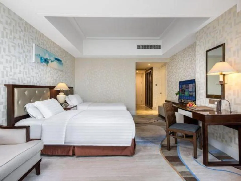 Bed in Hainan Junhua Haiyi Hotel