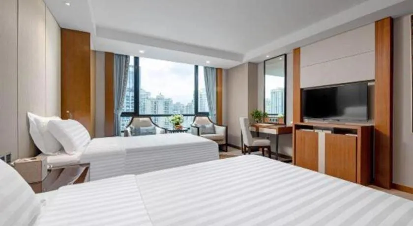 Bed in Hainan Junhua Haiyi Hotel