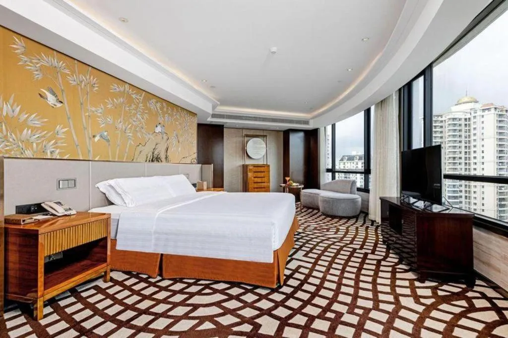 Bed in Hainan Junhua Haiyi Hotel