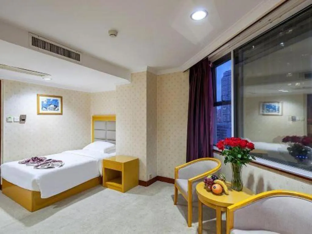Bed in Xiamen Plaza Hotel