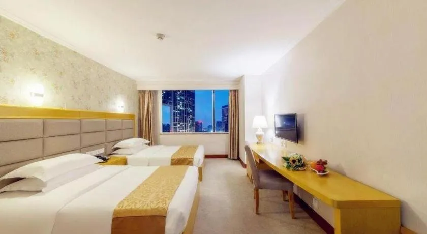 Bed in Xiamen Plaza Hotel