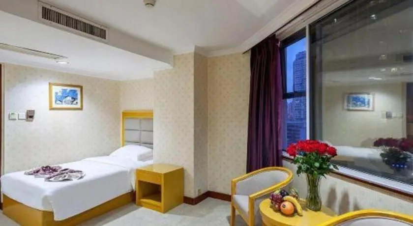 Bed in Xiamen Plaza Hotel