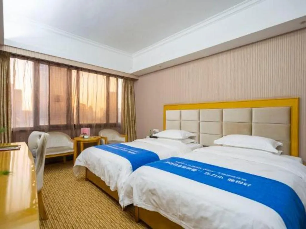 Bed in Xiamen Plaza Hotel