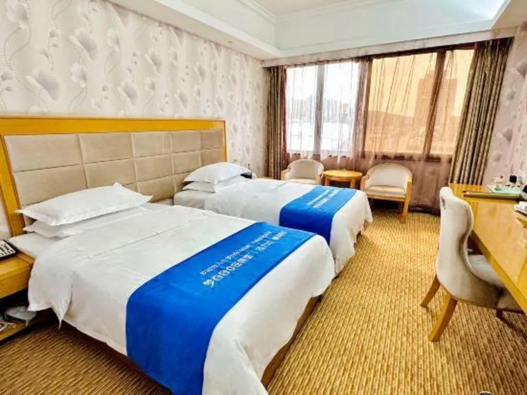 Bed in Xiamen Plaza Hotel