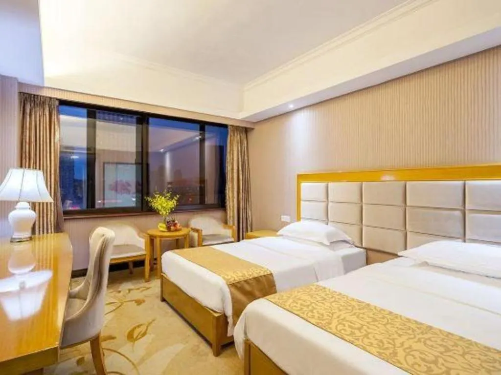 Bed in Xiamen Plaza Hotel