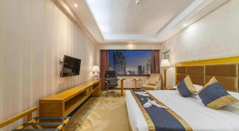 Bed in Xiamen Plaza Hotel