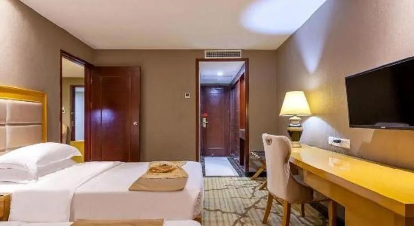 Bed in Xiamen Plaza Hotel