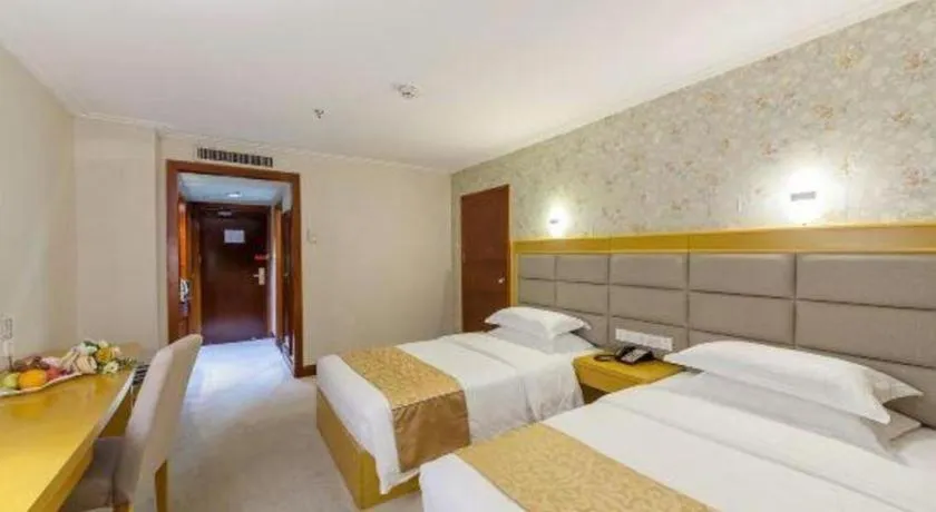 Bed in Xiamen Plaza Hotel