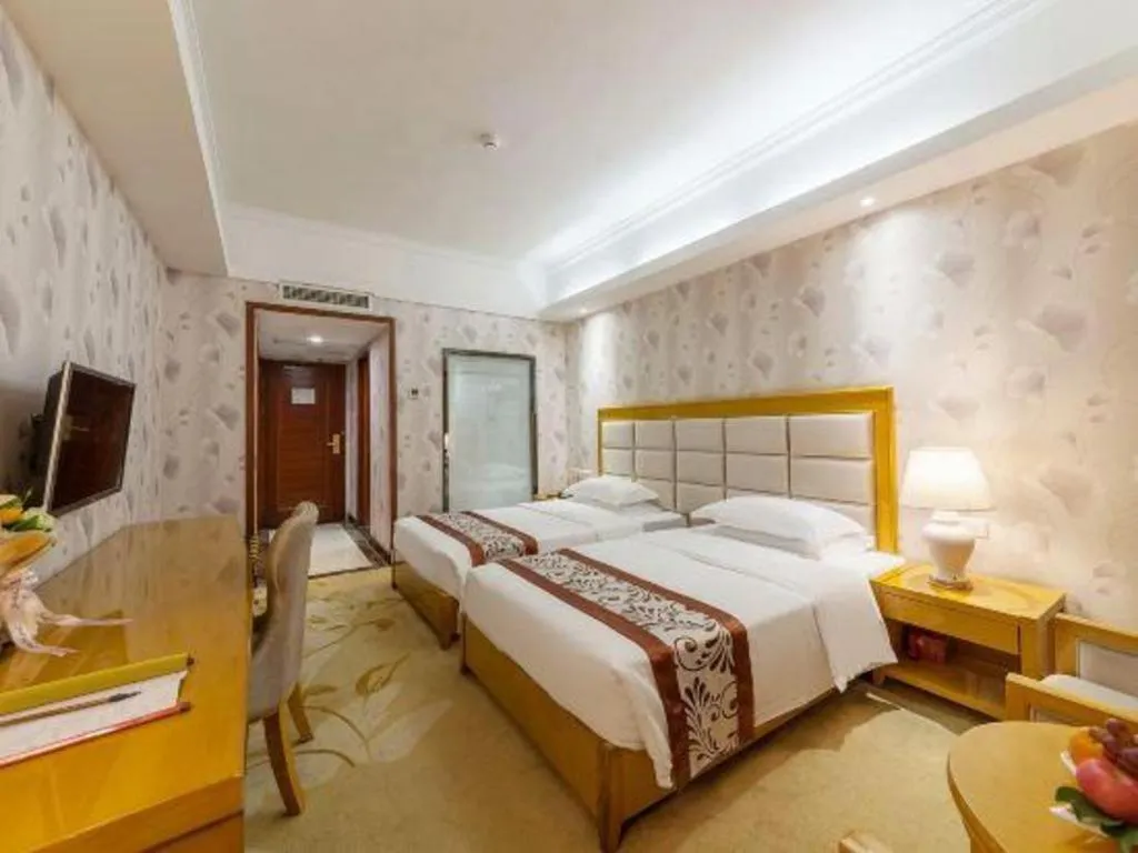 Bed in Xiamen Plaza Hotel