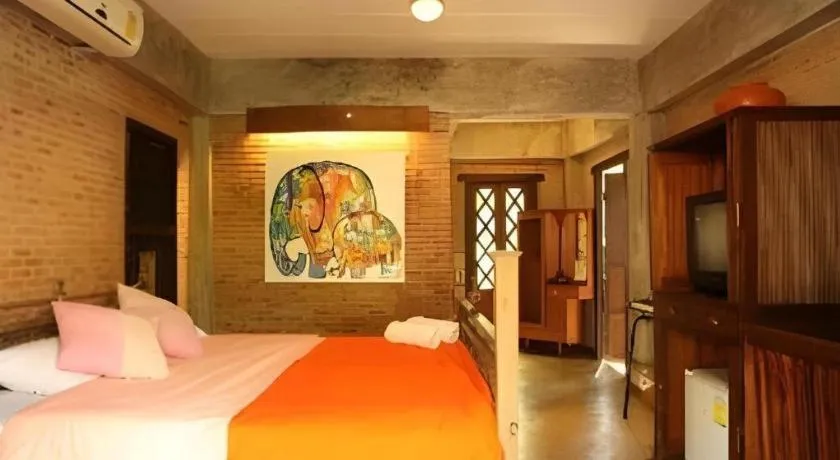 Bed in Baan Gong Kham Hotel