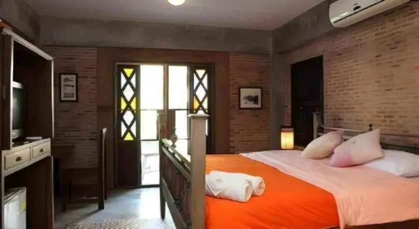 Bed in Baan Gong Kham Hotel