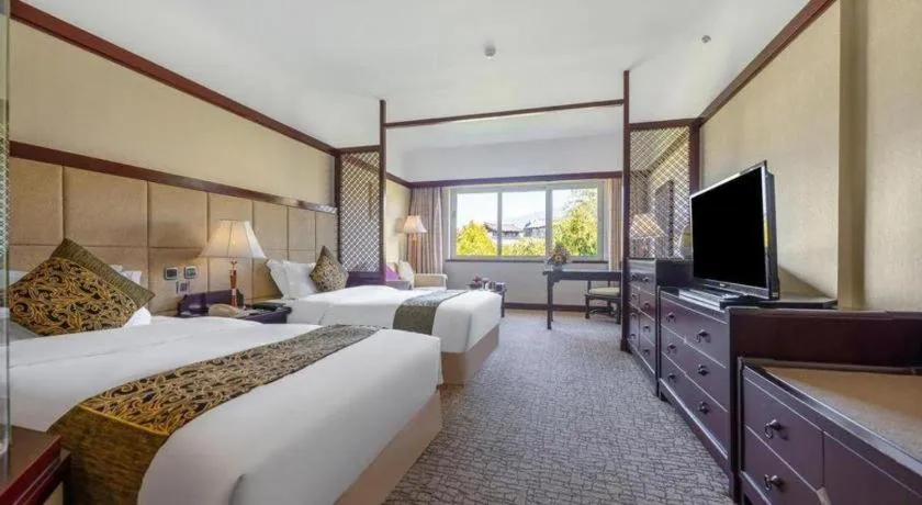 Bed in Wonderport International Hotel