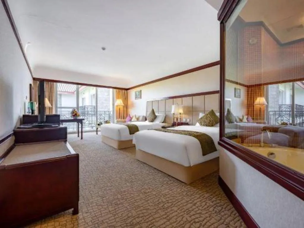 Bed in Wonderport International Hotel