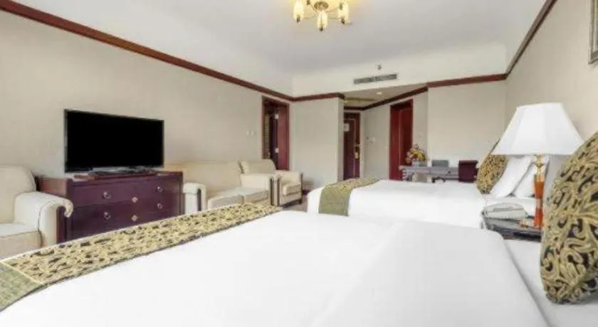 Bed in Wonderport International Hotel