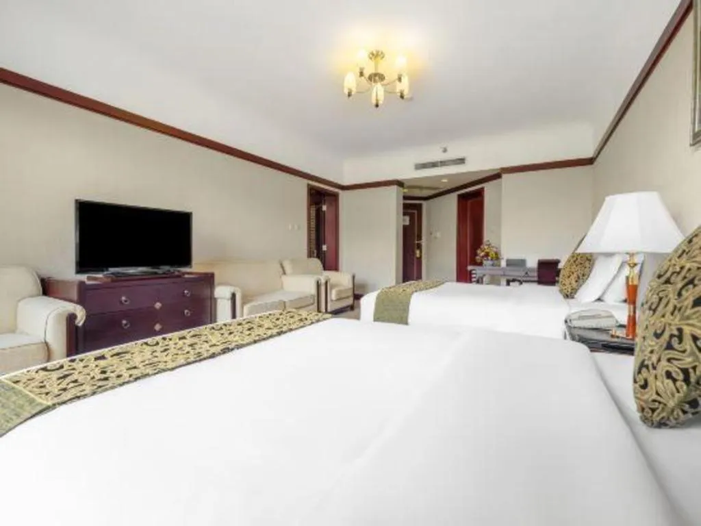 Bed in Wonderport International Hotel