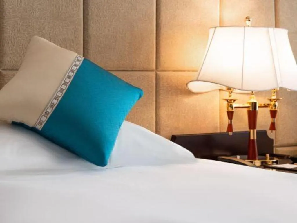 Bed in Wonderport International Hotel