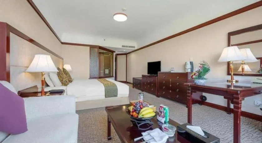 Bed in Wonderport International Hotel