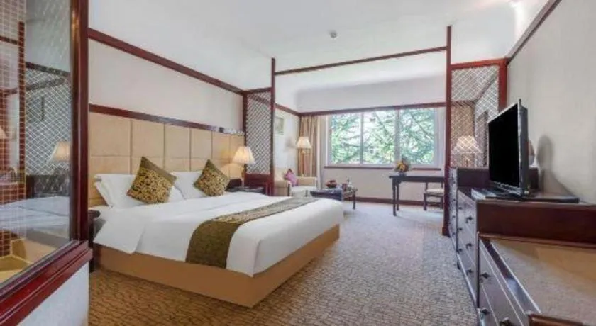 Bed in Wonderport International Hotel