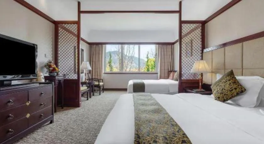 Bed in Wonderport International Hotel