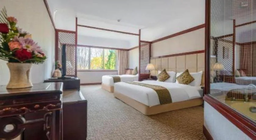 Bed in Wonderport International Hotel