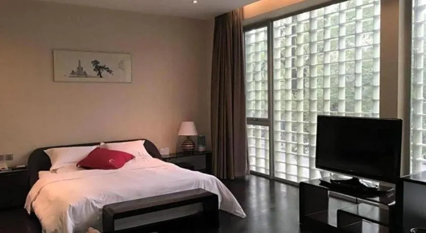 Bed in Hotel Kapok Wangfujing