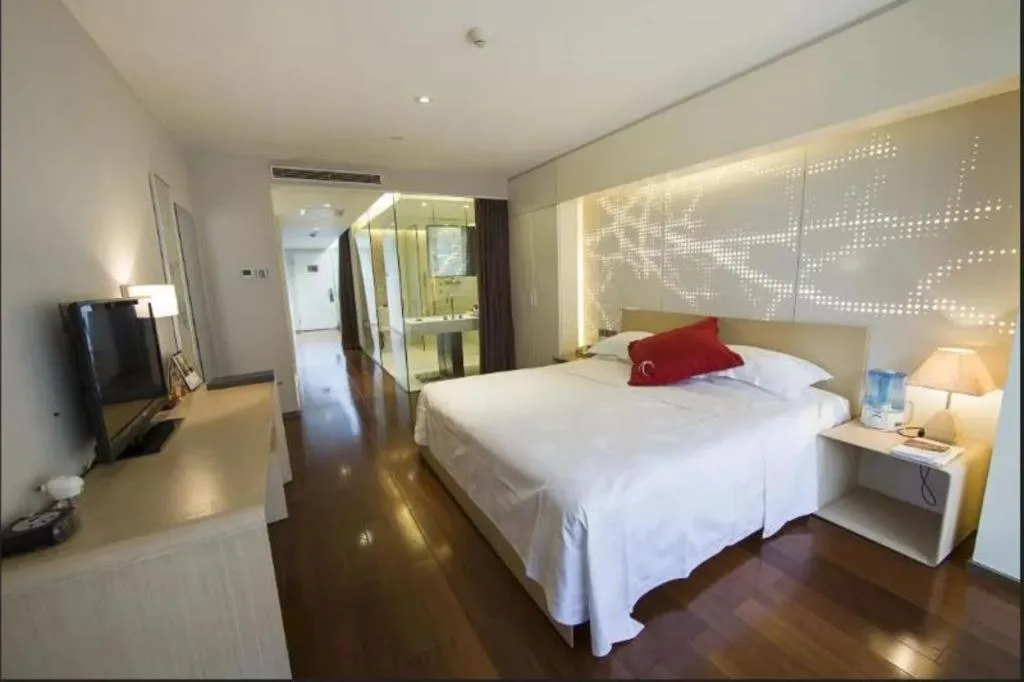 Bed in Hotel Kapok Wangfujing