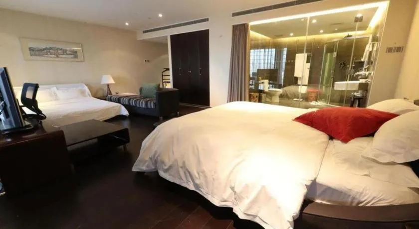 Bed in Hotel Kapok Wangfujing