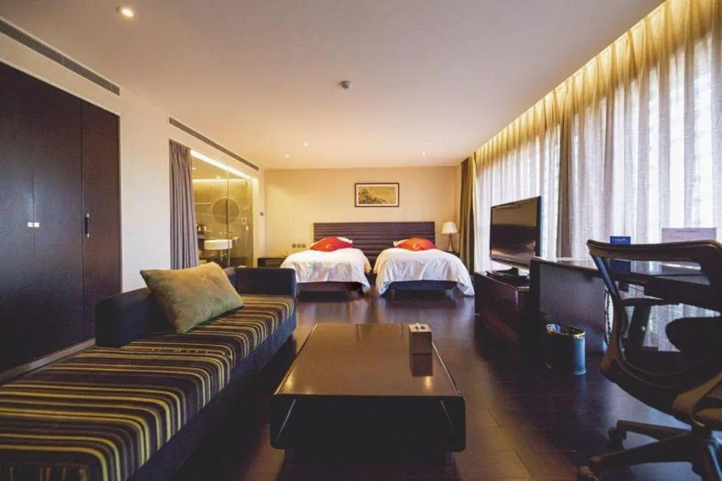 Bed in Hotel Kapok Wangfujing