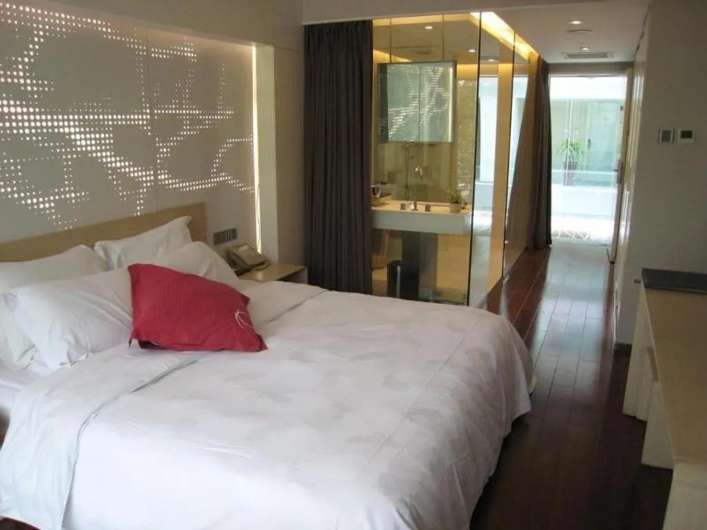 Bed in Hotel Kapok Wangfujing