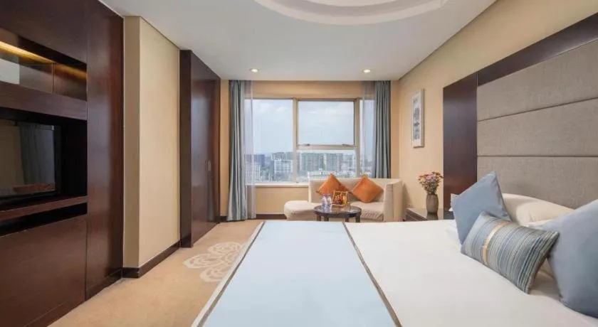 Bed in Yiwu Yimei Plaza Hotel