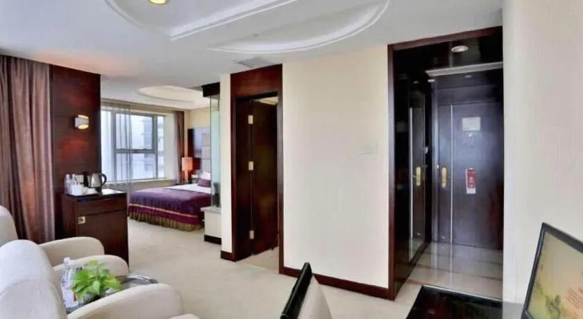 Bed in Yiwu Yimei Plaza Hotel