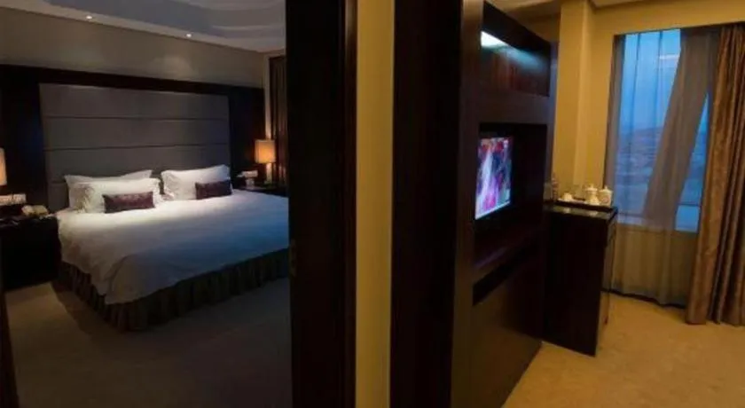 Bed in Yiwu Yimei Plaza Hotel