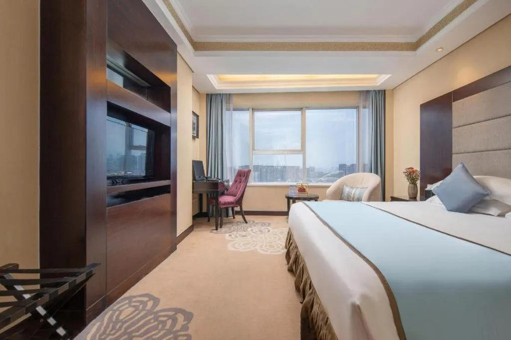 Bed in Yiwu Yimei Plaza Hotel