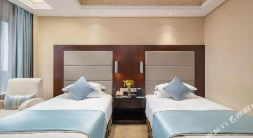 Bed in Yiwu Yimei Plaza Hotel