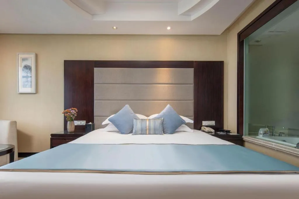 Bed in Yiwu Yimei Plaza Hotel