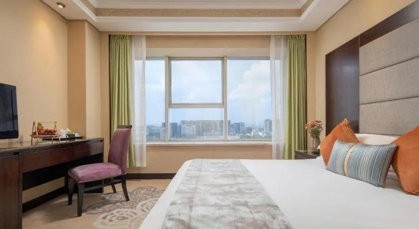 Bed in Yiwu Yimei Plaza Hotel