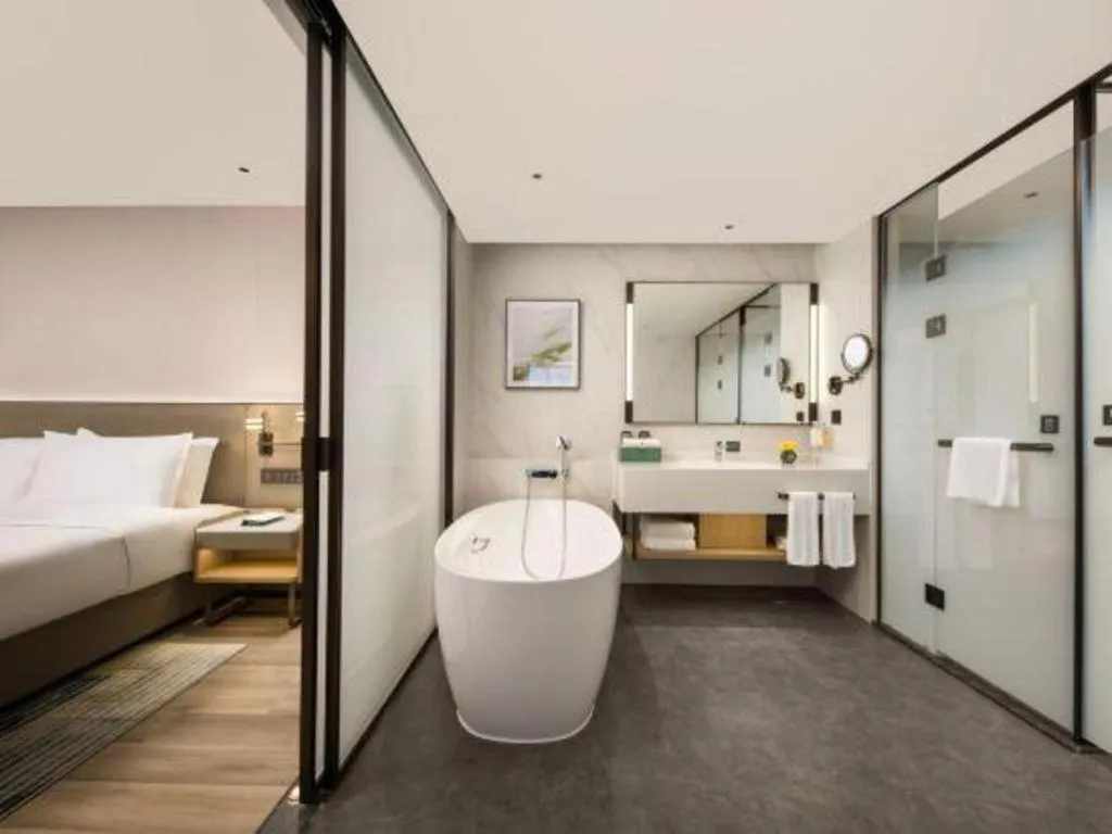 Bed in Yiwu Yimei Plaza Hotel