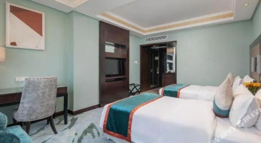 Bed in Yiwu Yimei Plaza Hotel