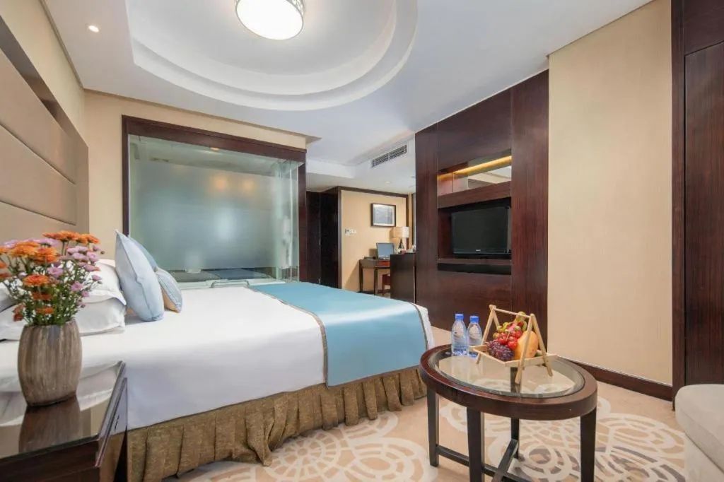 Bed in Yiwu Yimei Plaza Hotel