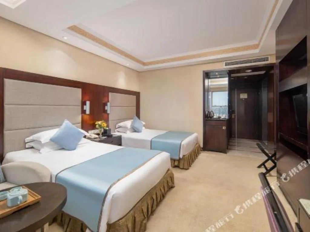 Bed in Yiwu Yimei Plaza Hotel