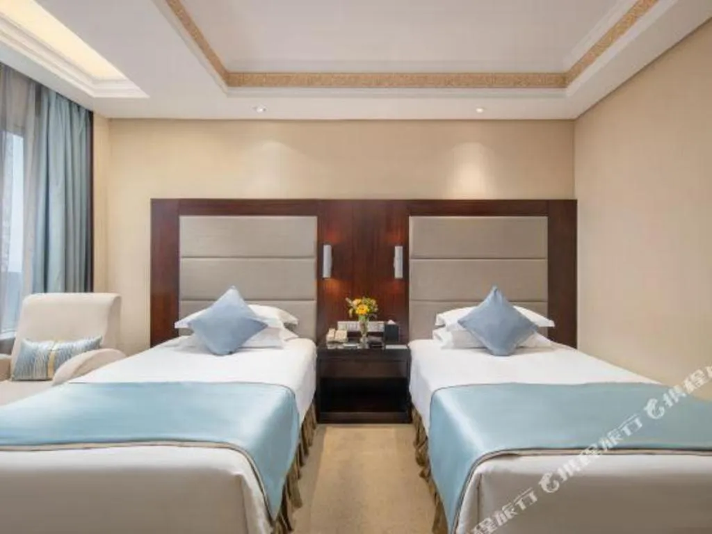 Bed in Yiwu Yimei Plaza Hotel