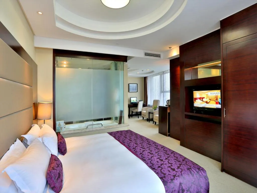 Bed in Yiwu Yimei Plaza Hotel