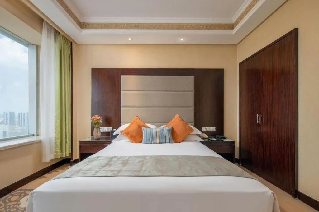 Bed in Yiwu Yimei Plaza Hotel