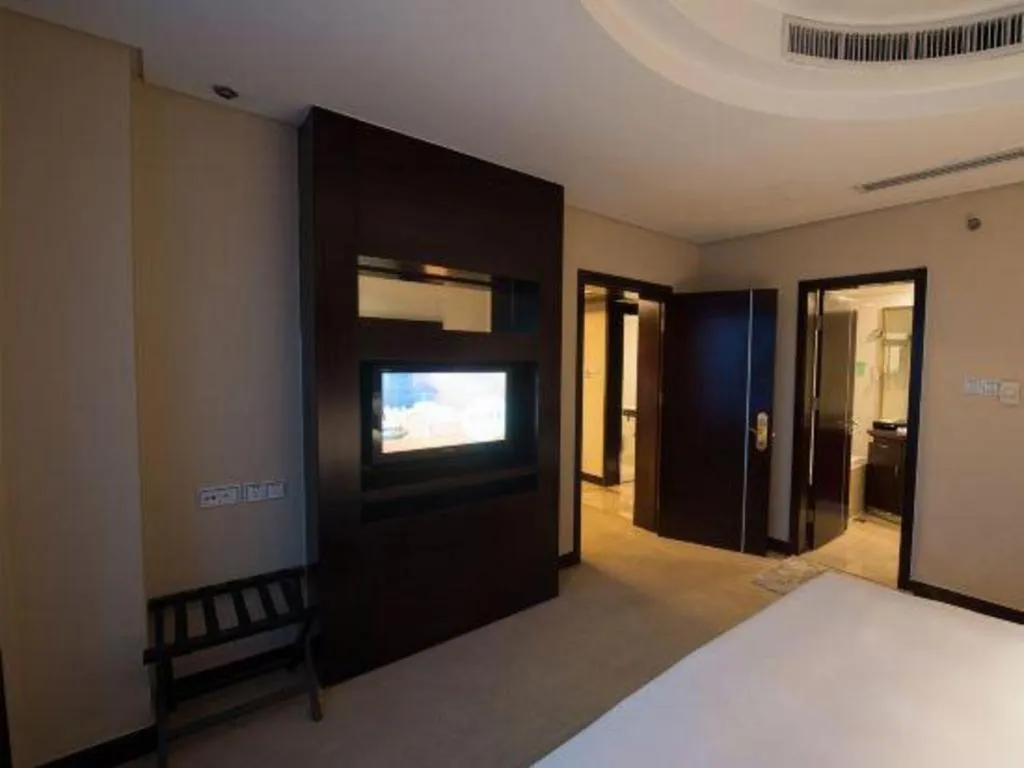 Bed in Yiwu Yimei Plaza Hotel