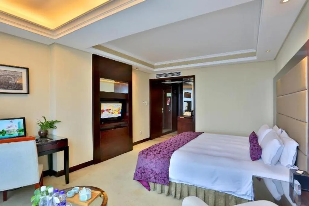 Bed in Yiwu Yimei Plaza Hotel