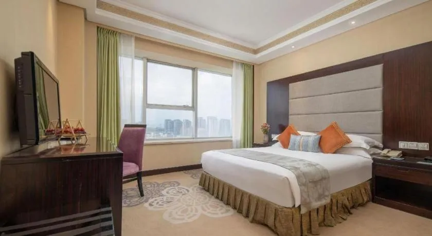 Bed in Yiwu Yimei Plaza Hotel